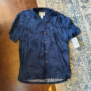 Paradise found size medium blue Hawaiian shirt.